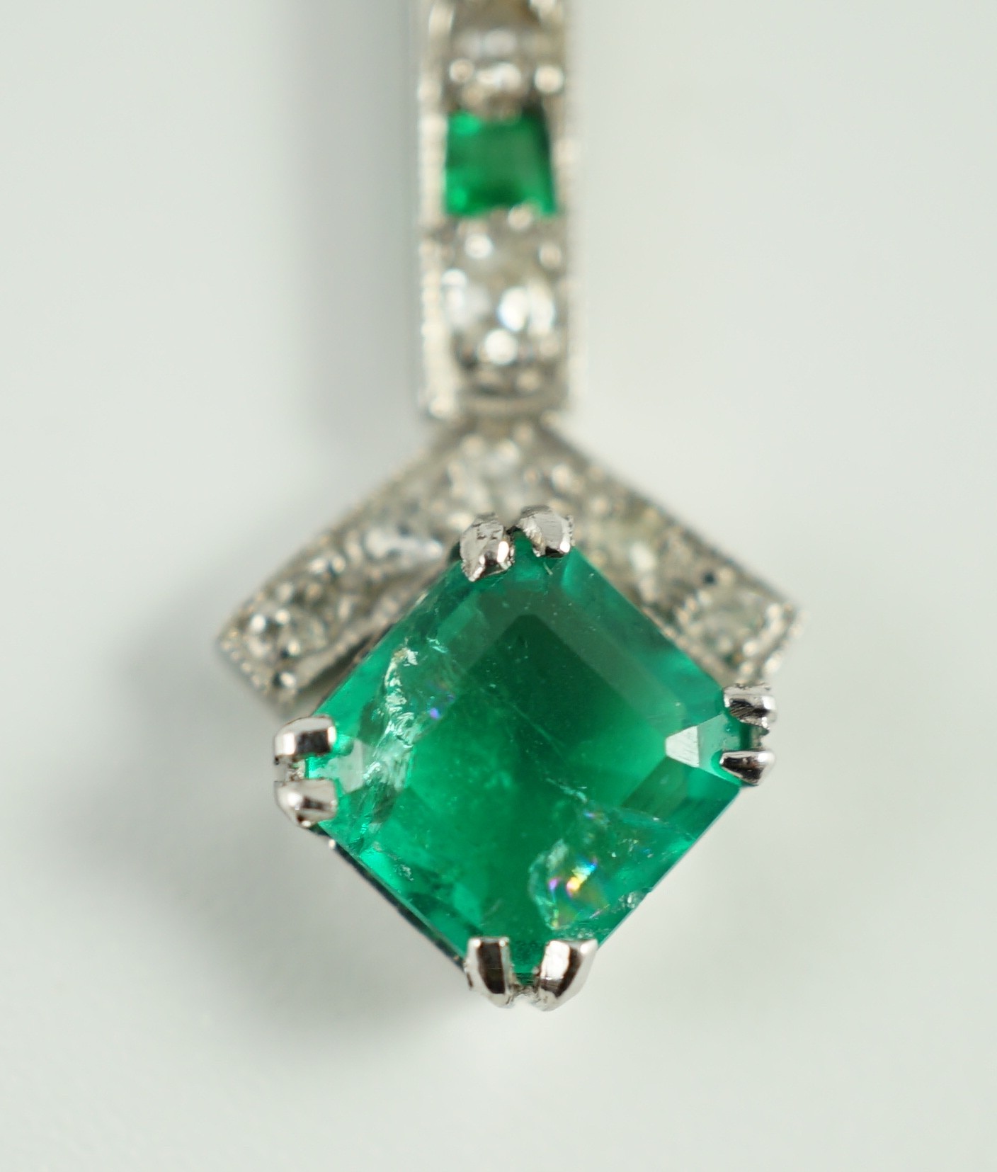 A 1920's platinum?, emerald and diamond set pendant necklace